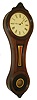E. Howard & Co., Boston, Mass., "No. 8 Regulator" figure eight wall clock, 8 days, time only, weight driven movement signed "HOWARD & DAVIS BOSTON" in a walnut case with painted metal dial and reverse painted tablets, c1870