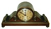 Chelsea Clock CO., Chelsea, Mass., for Shreve, Crump & Low, Boston, "Tambour No. 3", with 5" dial, patinated cast bronze case on ball feet, front of base engraved "V. Grande", bezel with convex, beveled glass, Arabic numeral, silvered dial withy black painted steel moon hands, 8 day time and strike movement sounding the hours and half hour on a gong, serial #180173, c1925