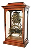 Ithaca Calendar Clock Co., Ithaca, NY, "Box Skeleton" shelf clock, 8 days, time and strike, spring driven movement in a mahogany with ebonized trim  cabinet glass sided case, c1875