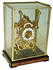 Skeleton clock, China, after the style of John Harrison, with a grasshopper escapement, single fusee timepiece, in a glass and brass case, modern