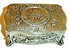 Germany, singing bird box, sterling silver case with serpentine front and sides, scrolled foliate feet, repousse decorated with putto frolicking in landscapes, the brightly colored bird with silver beak emerges from the top when the lever is pushed, does his song and dance routine, and then disappears from view, c1980