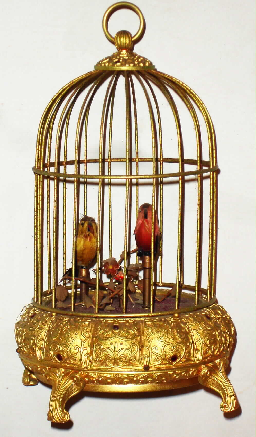 German pair of singing birds in a fancy bejeweled brass cage, 20th century — Antique Clocks Price Guide