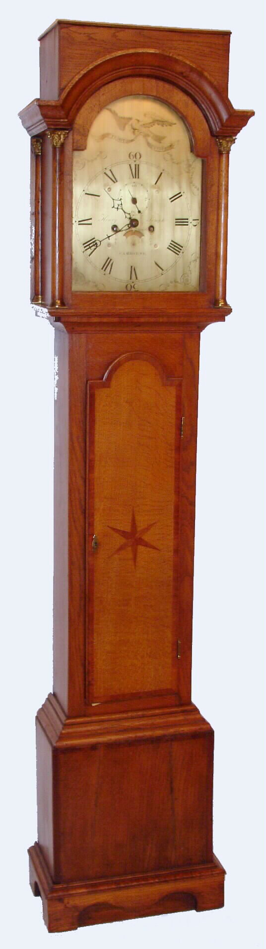 Henry Joseph, Camborne, English tall case clock with 8 day, time and bell strike, weight driven movement in oak case with brass dial decorated with eagle grasping banner reading "TEMPUS FUGIT", c1830 — Antique Clocks Price Guide