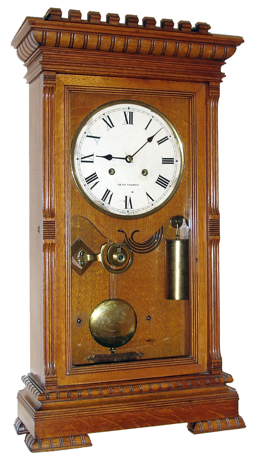 Seth Thomas Clock Co., Thomaston, Conn., "Garfield" mantel clock, 8 day, time and gong strike, weight driven movement in oak case with painted metal dial, c1890 — Antique Clocks Price Guide