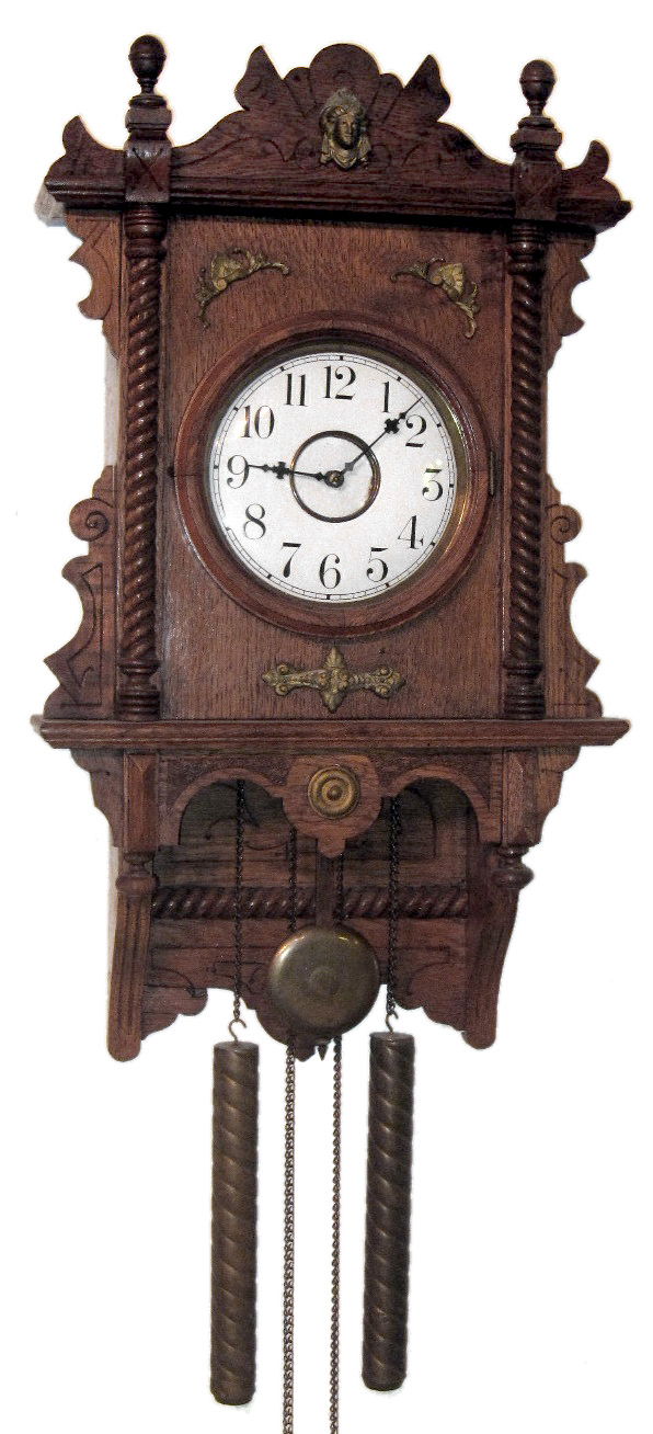Waterbury Clock Co., Waterbury, Conn., "Study" unknown model wall clock, 8 day, time and strike, two weight driven movement in an oak case with papered dial, c1905 — Antique Clocks Price Guide