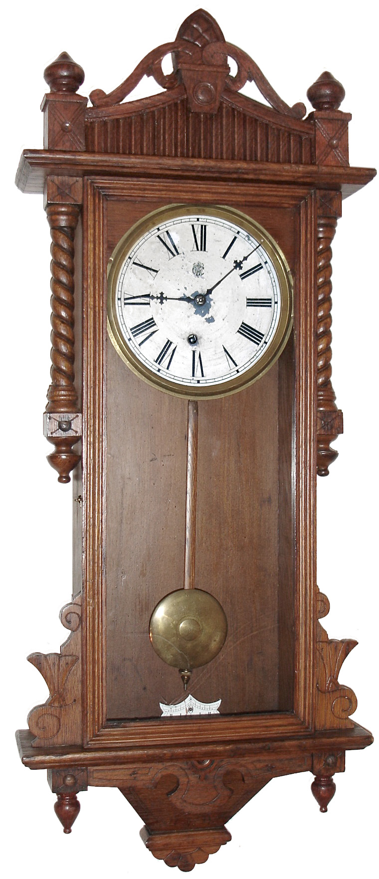 Waterbury Clock Co., Waterbury, Conn., "Elgin" wall clock, 8 day, time only, spring driven movement in an oak case with painted metal dial, c1900 — Antique Clocks Price Guide