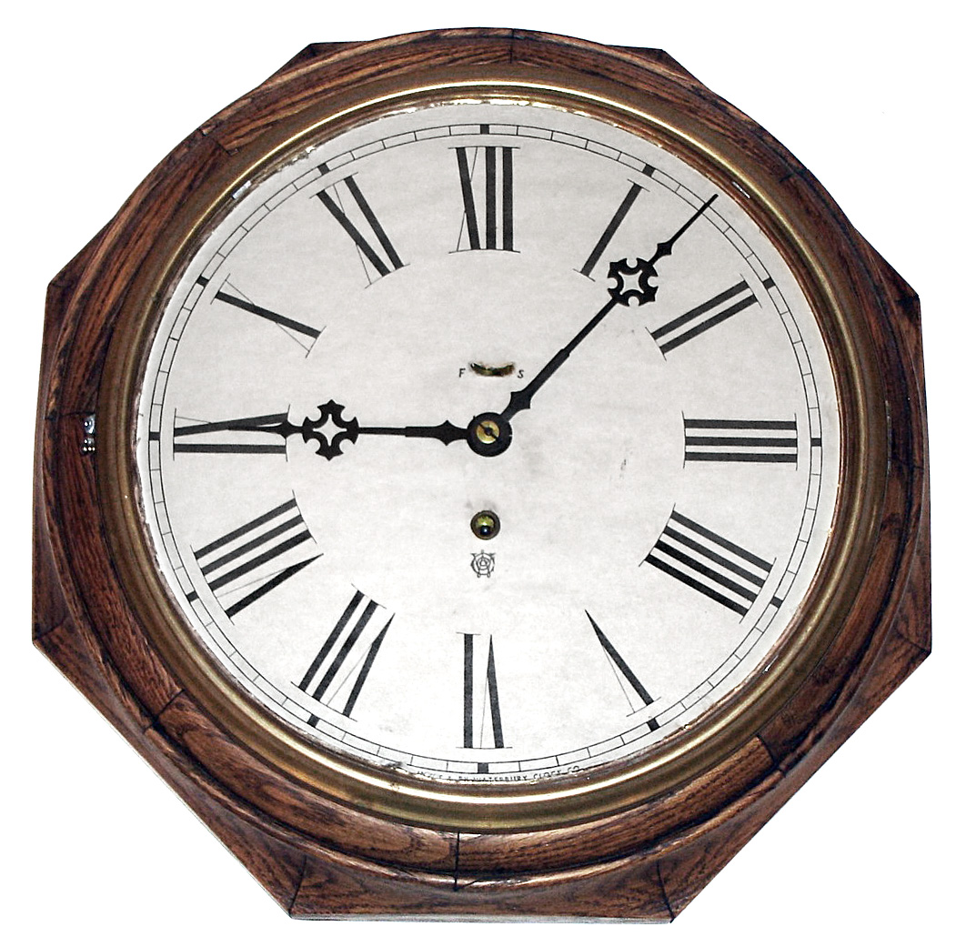 Waterbury Clock Co., Waterbury, Conn., "12 Inch Oak Lever" wall clock, 8 day, time only, spring driven movement in an octagonal oak case with papered metal dial, c1906 — Antique Clocks Price Guide