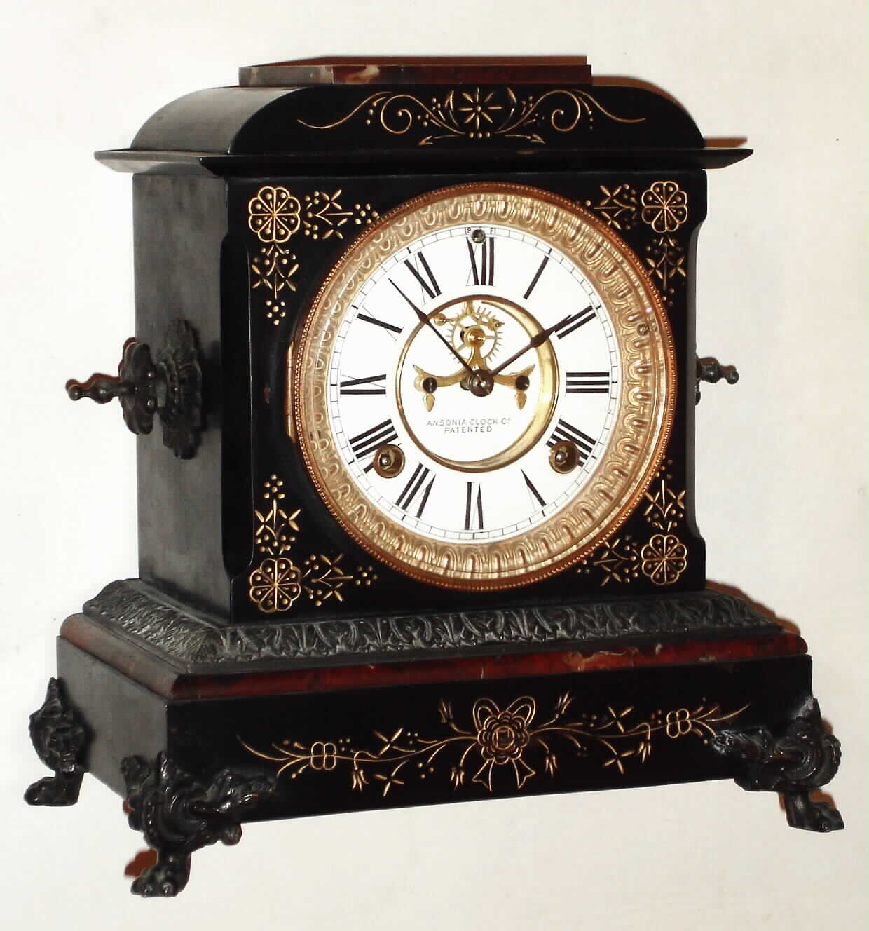 Ansonia Clock Co., Ansonia, Conn., "St. Clair", 8 day, time and strike, Enameled Iron case mantel clock, c1886 — Antique Clocks Price Guide