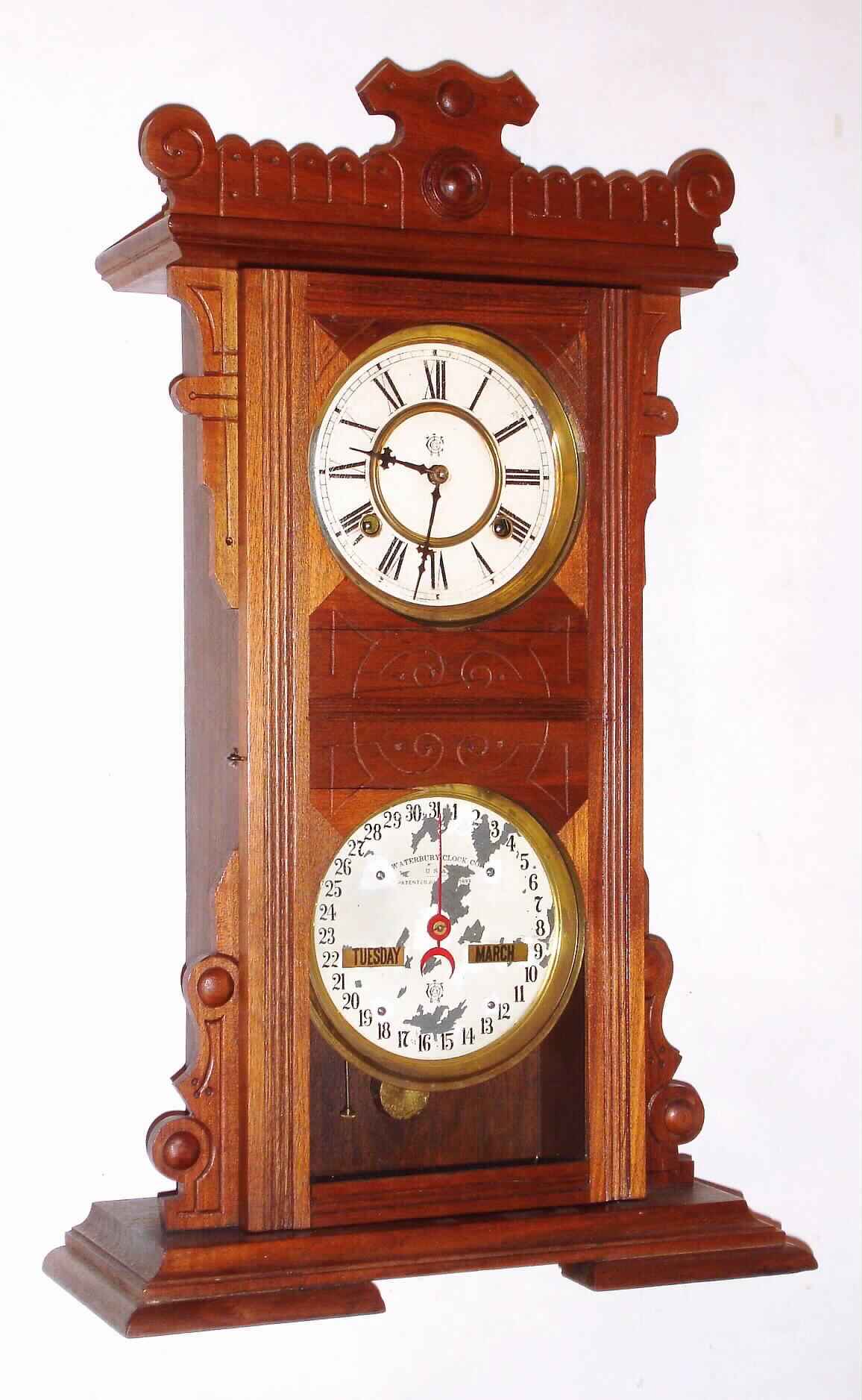 Waterbury Clock Co., Waterbury, Conn., "Calendar No. 44", 8 day, time and strike, double dial calendar clock, c1891 — Antique Clocks Price Guide