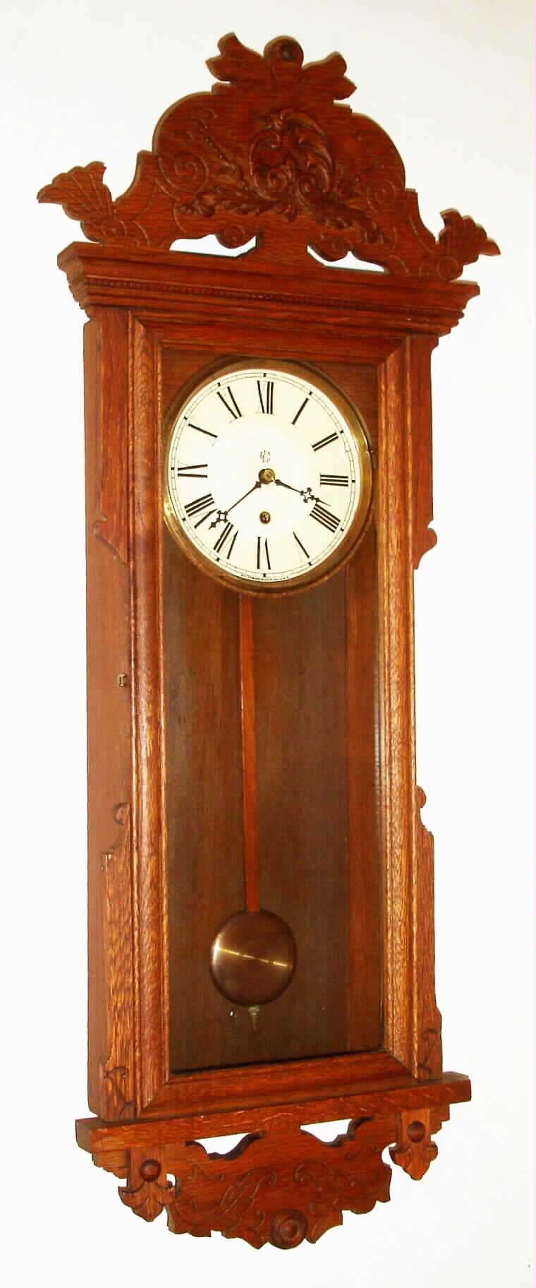 Waterbury Clock Co., Waterbury, Conn., "Aurora", 8 day oak wall time piece, c1896 — Antique Clocks Price Guide