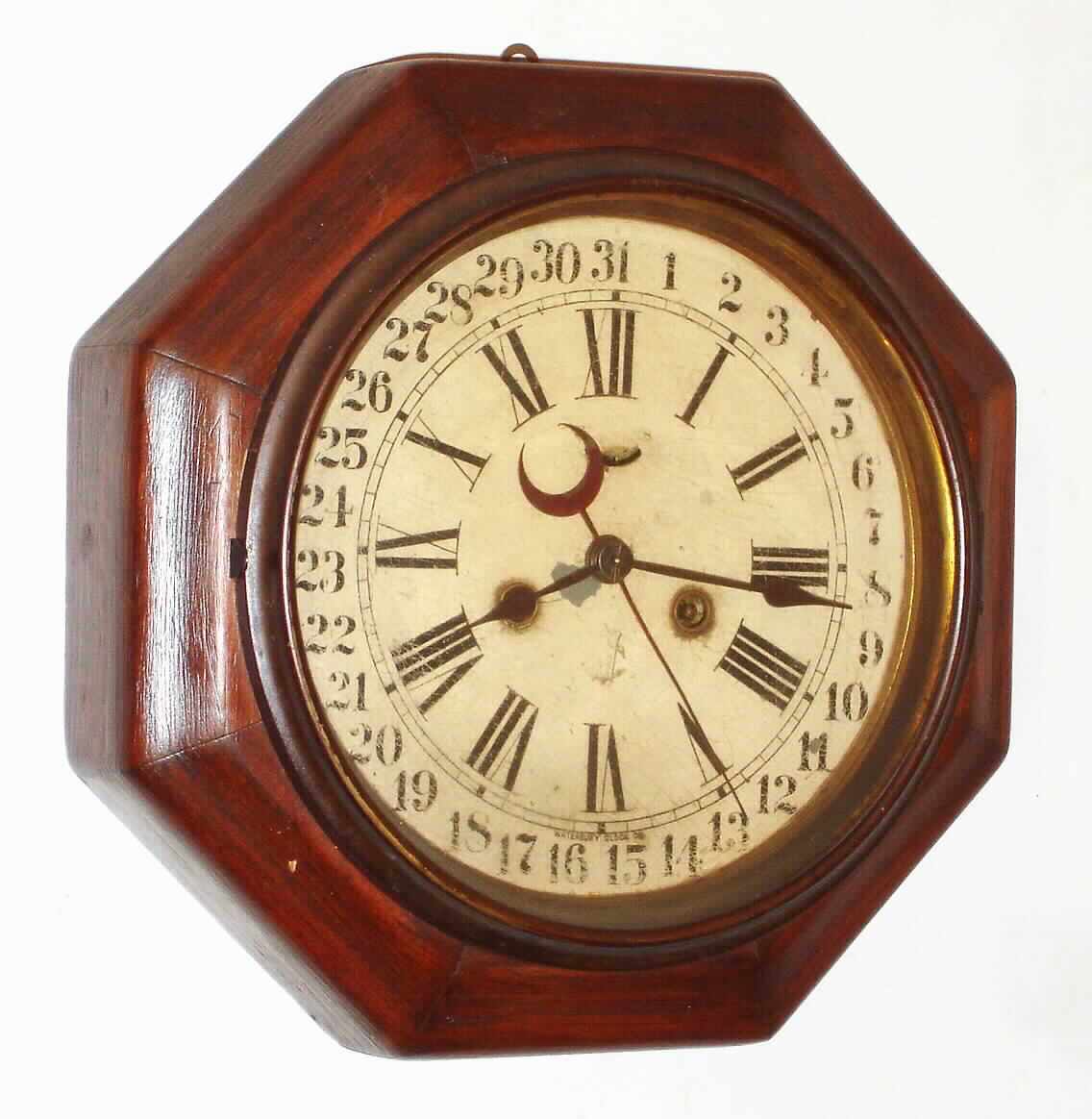 Waterbury Clock Co., Waterbury, Conn., "8 Inch Octagon with Calendar", 8 day? lever movement wall time piece, c1903 — Antique Clocks Price Guide