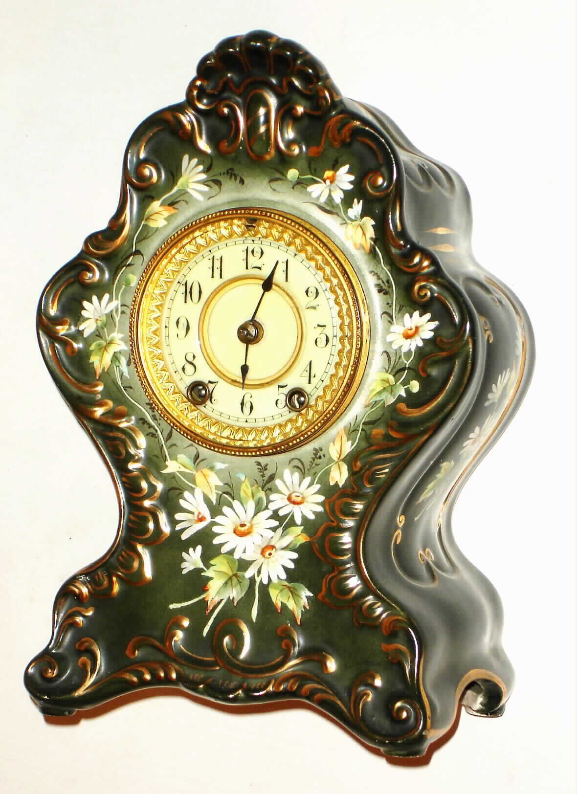 Waterbury Clock Co., Waterbury, Conn., 8 day, time and strike porcelain mantel clock, c1900 — Antique Clocks Price Guide
