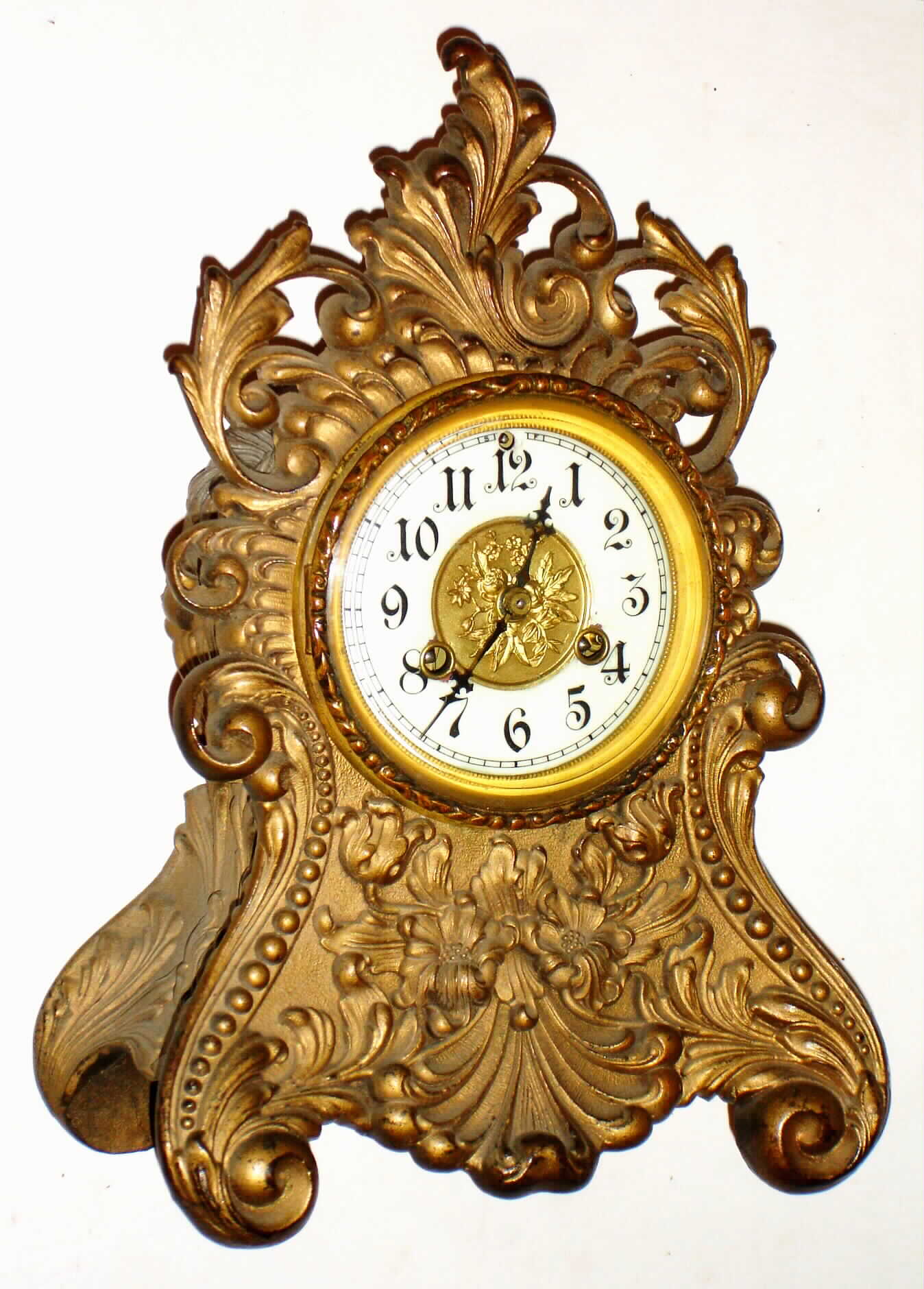Waterbury Clock Co., Waterbury, Conn., cast metal 8 day, time and strike mantel clock, c1906 — Antique Clocks Price Guide