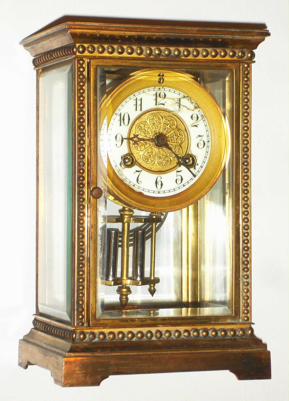Waterbury Clock Co., Waterbury, Conn., brass and glass 8 day, time and strike presentation crystal regulator, 1905 — Antique Clocks Price Guide