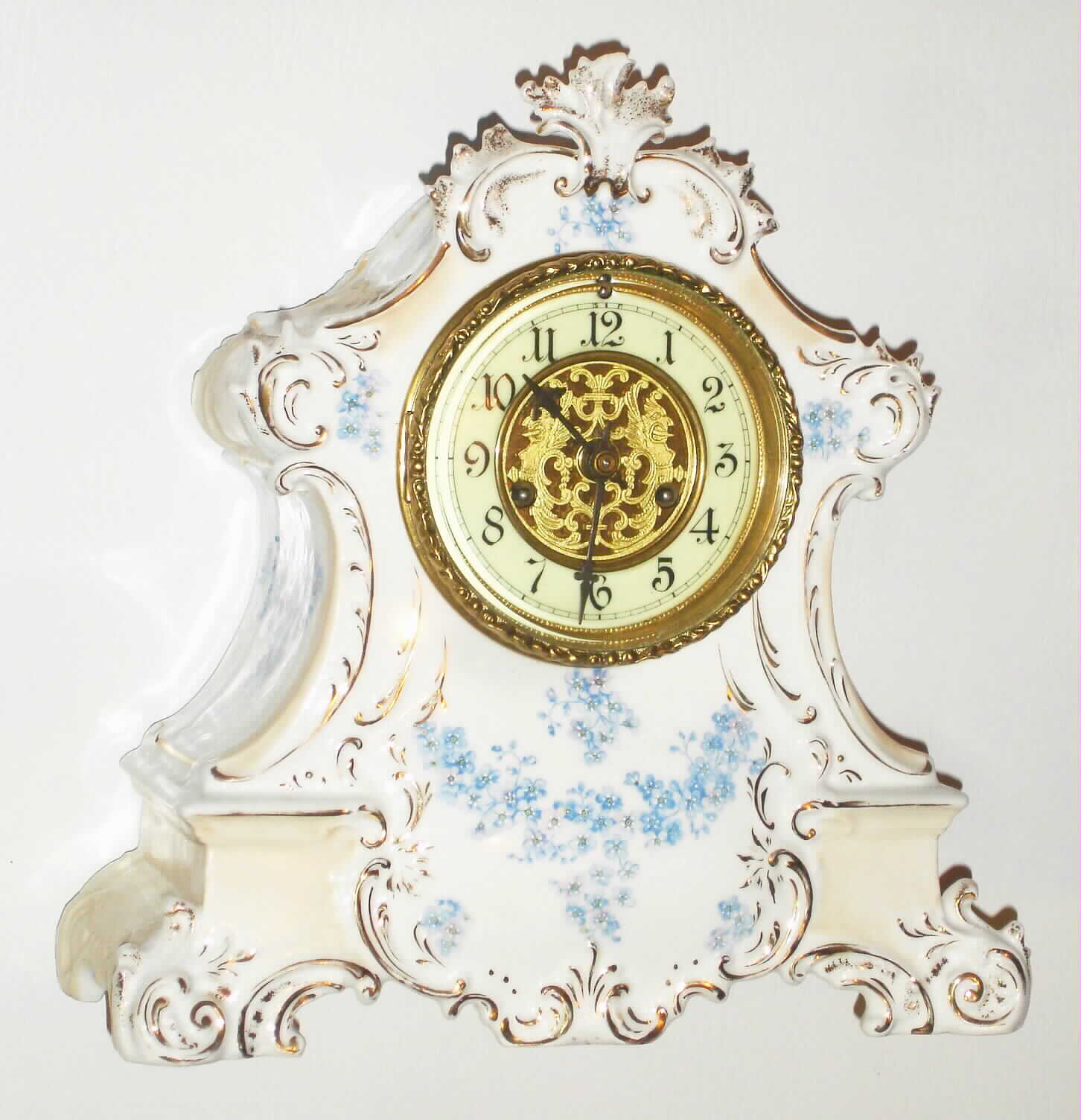 Waterbury Clock Co., Waterbury, Conn., 8 day, time and strike porcelain mantel clock, c1900 — Antique Clocks Price Guide