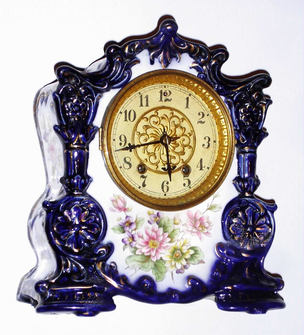Waterbury Clock Co., Waterbury, Conn., "No. 95" 8 day, time and strike porcelain mantel clock, c1900 — Antique Clocks Price Guide