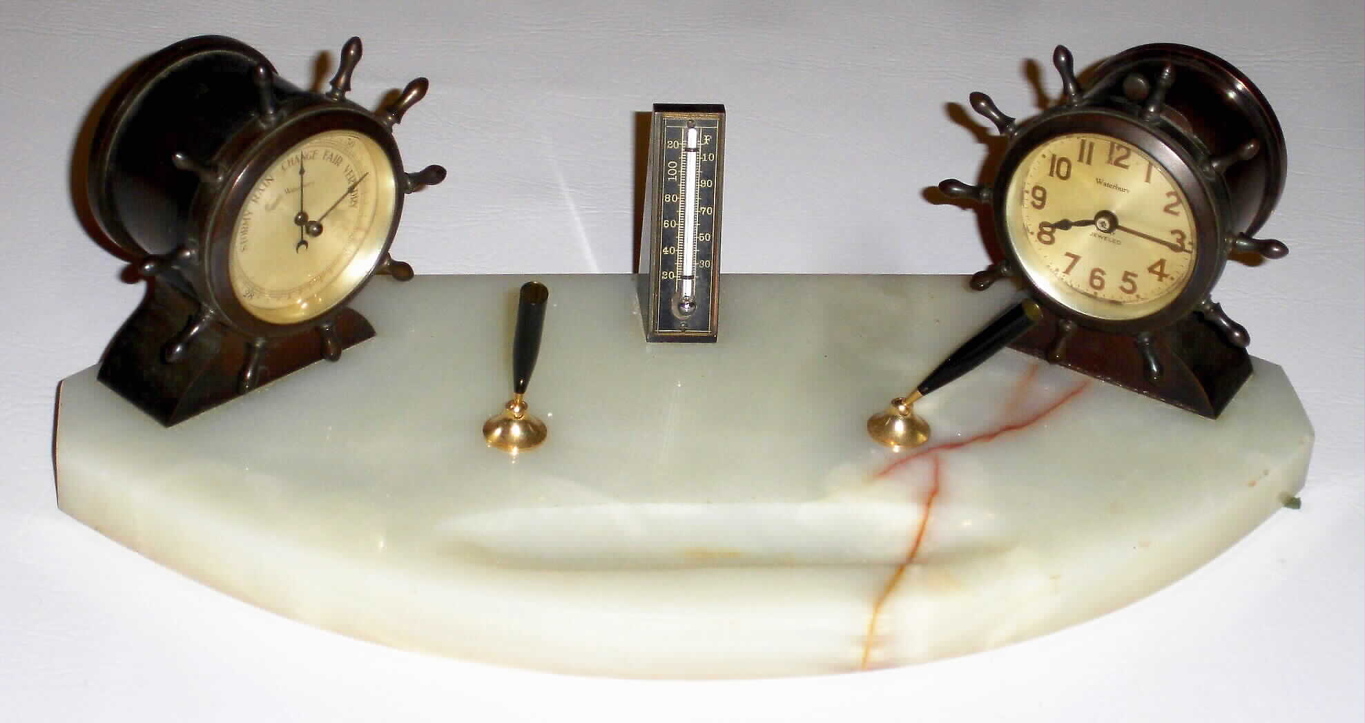 Waterbury Clock Co., Waterbury, Conn., "Desk Set No. 3" 8 day ship's time piece with barometer on onyx base, c1929 — Antique Clocks Price Guide