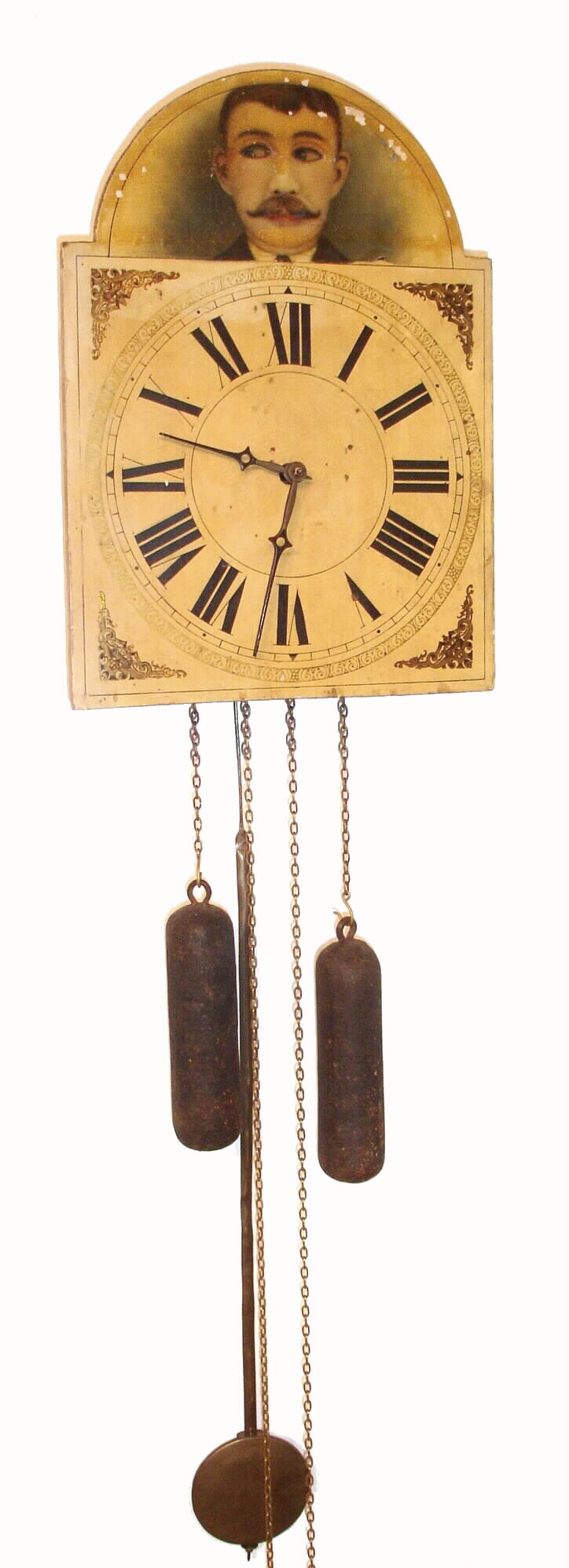 German, Black Forest, Wooden plated automaton shield clock (Gentleman's eyes move back and forth behind openings in dial), striking full quarters (Grand Sonnerie) on two weights, approx 2-day duration, c1890. — Antique Clocks Price Guide