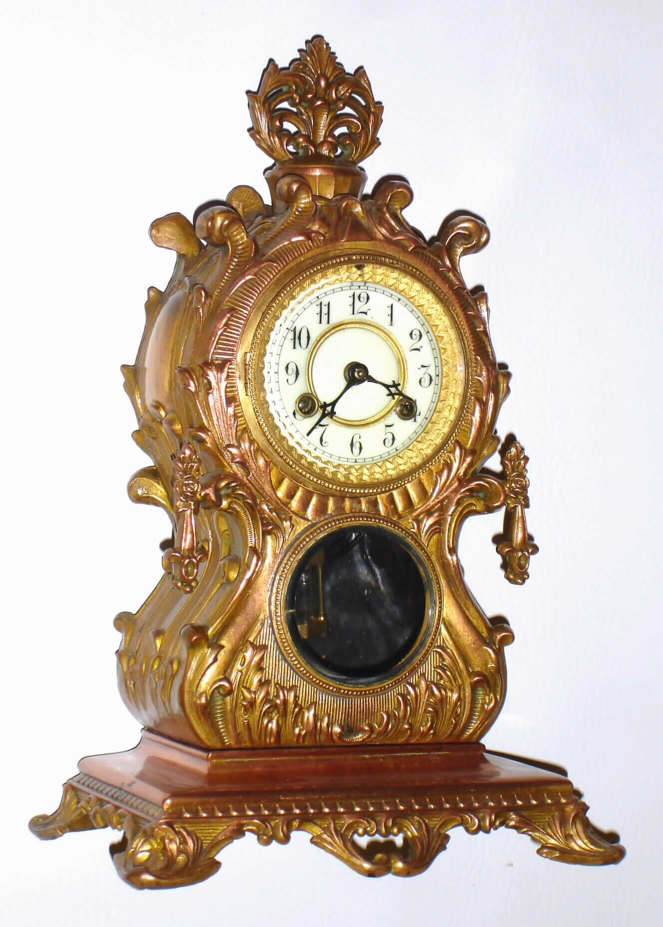 Waterbury Clock Co., Waterbury, Conn., "Clymer" gold plated cast metal 8 day, time and strike mantel clock, c1906 — Antique Clocks Price Guide