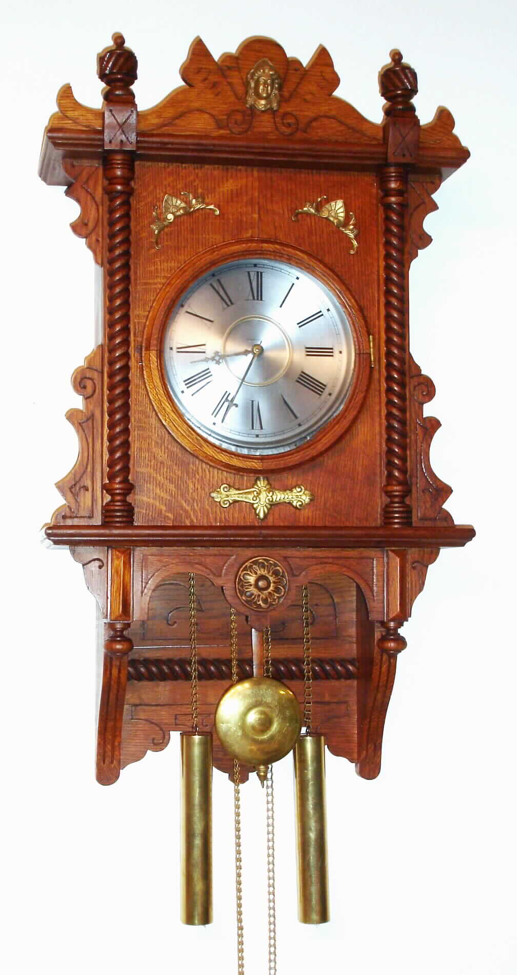 Waterbury Clock Co., Waterbury, Conn., "Study", unknown model , 8 day, time and strike, oak case wall clock, c1905. — Antique Clocks Price Guide