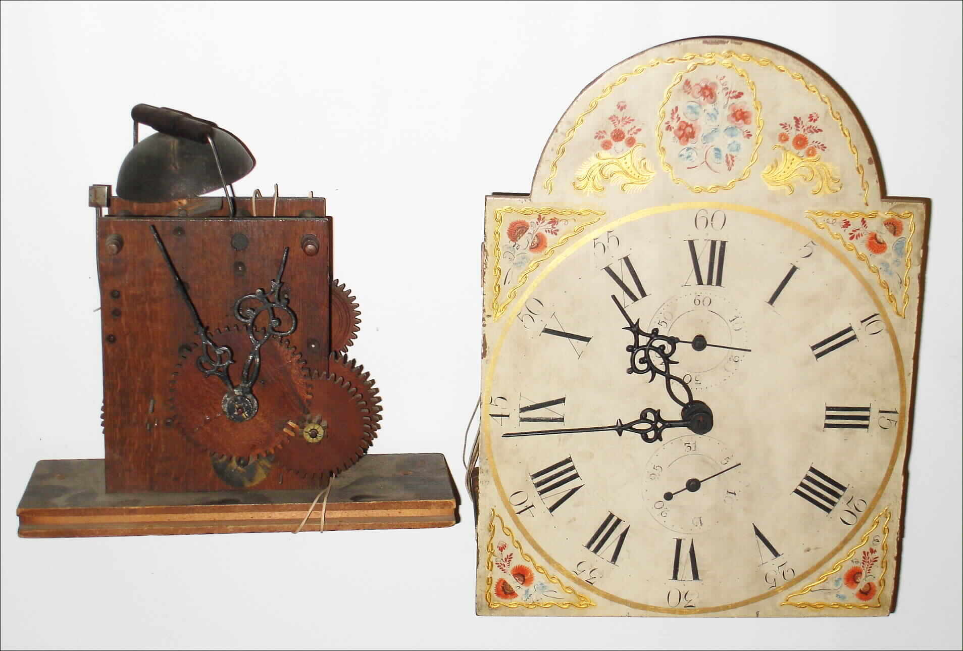 American wooden works tall case movement, dial and hands; and an additional tall case wooden movement. — Antique Clocks Price Guide