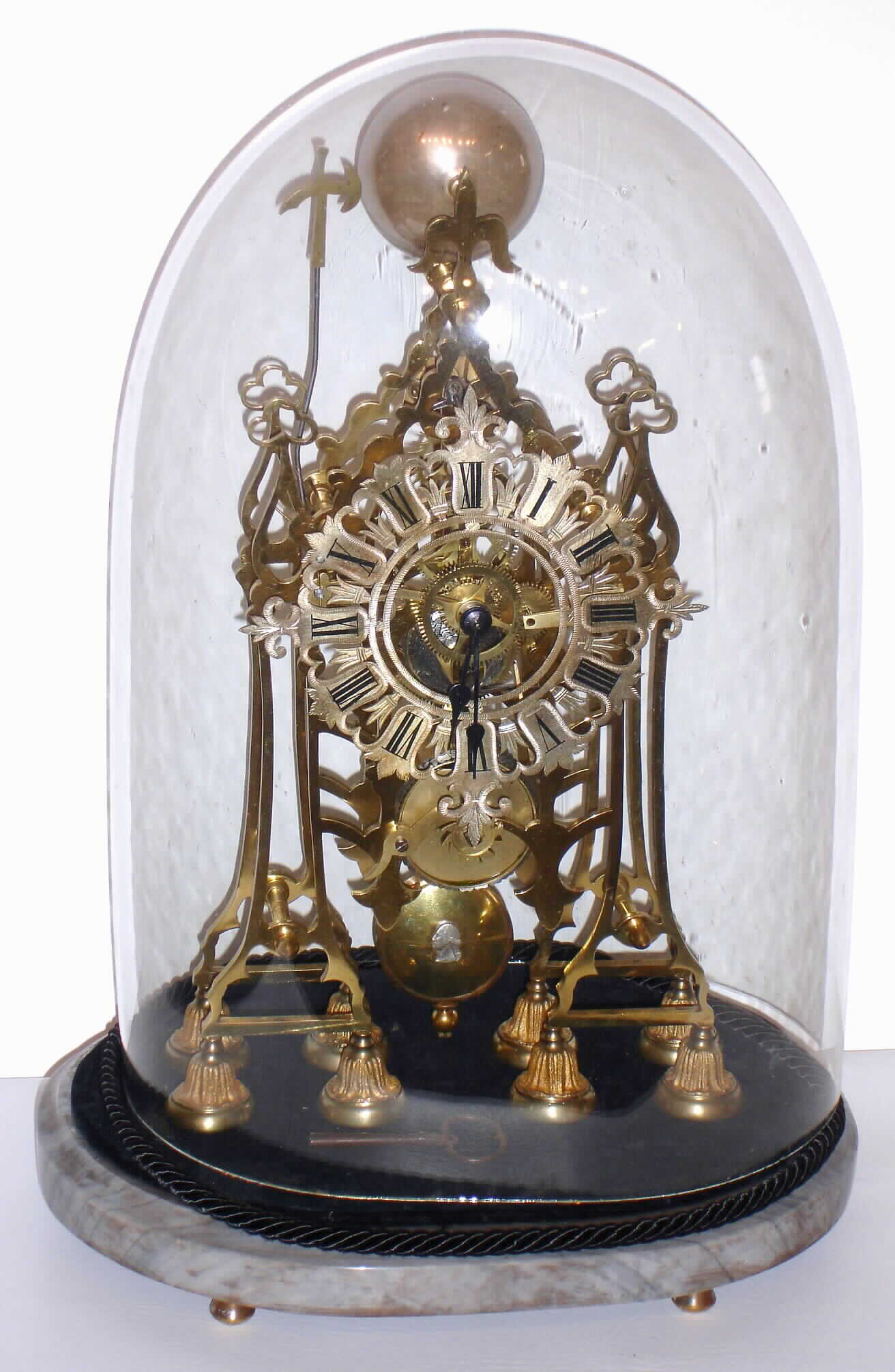 English single fusee skeleton clock, passing strike, with oval glass dome, George Washington decorated pendulum and marble base, c1870 — Antique Clocks Price Guide