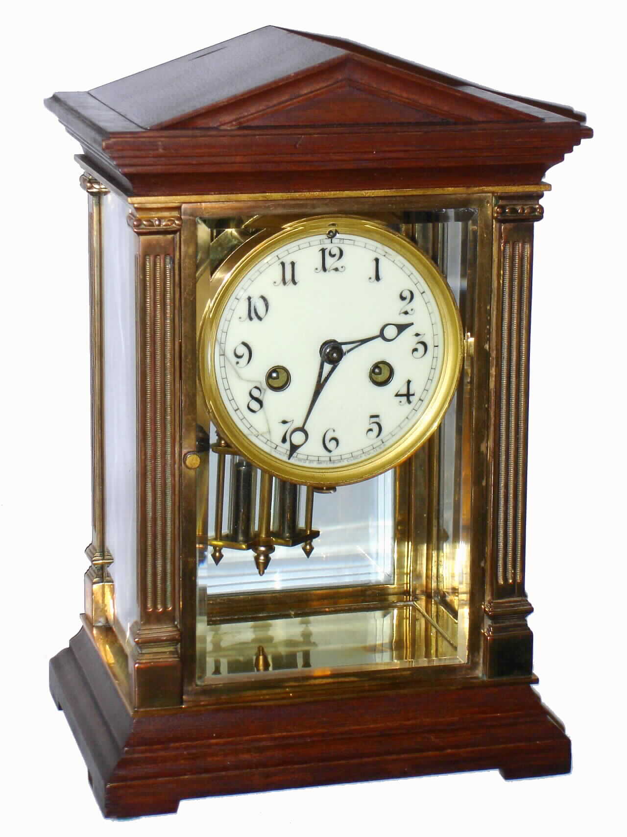 Waterbury Clock Co., Waterbury, Conn., "Marnay" mahogany and gold plated 8 day, time and strike crystal regulator, c1914 — Antique Clocks Price Guide