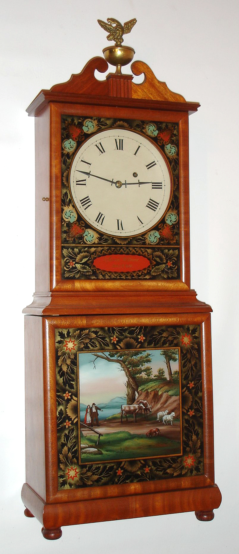 Reproduction Aaron Willard Massachusetts shelf clock , 8 day, time piece made by Edwin B. Burt, Exeter, NH, glasses painted by his son Hershel Burt, c1960. Ed ran the Burt Dial Co. for about 35 years and 1957 acquired the Adams Brown Co. that sold horological books until it was sold in 1982. Ed. died in 1971. — Antique Clocks Price Guide