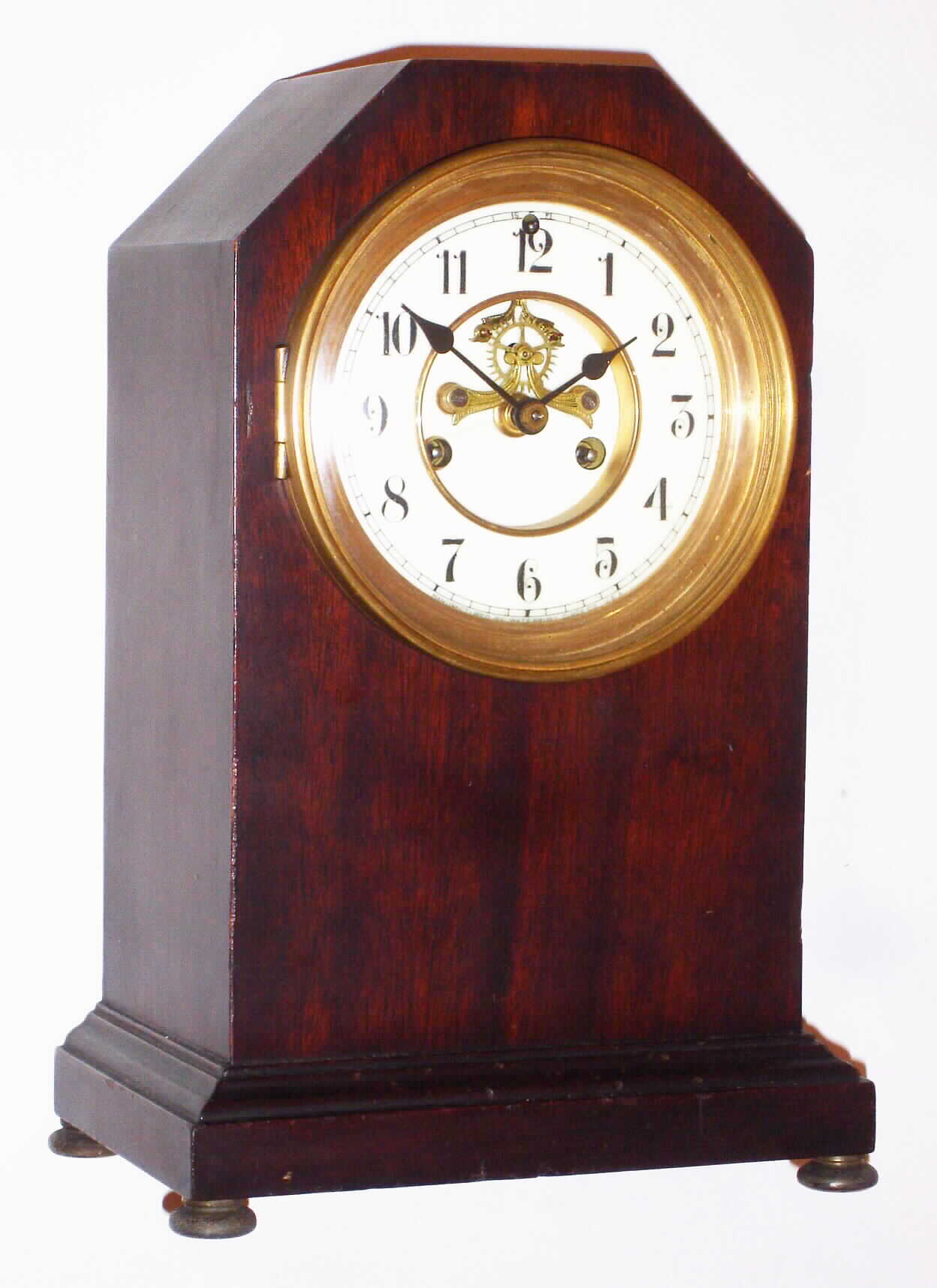 Waterbury Clock Co., Waterbury, Conn., "Cornwall" mahogany 8 day, time and strike cabinet clock, c1910 — Antique Clocks Price Guide