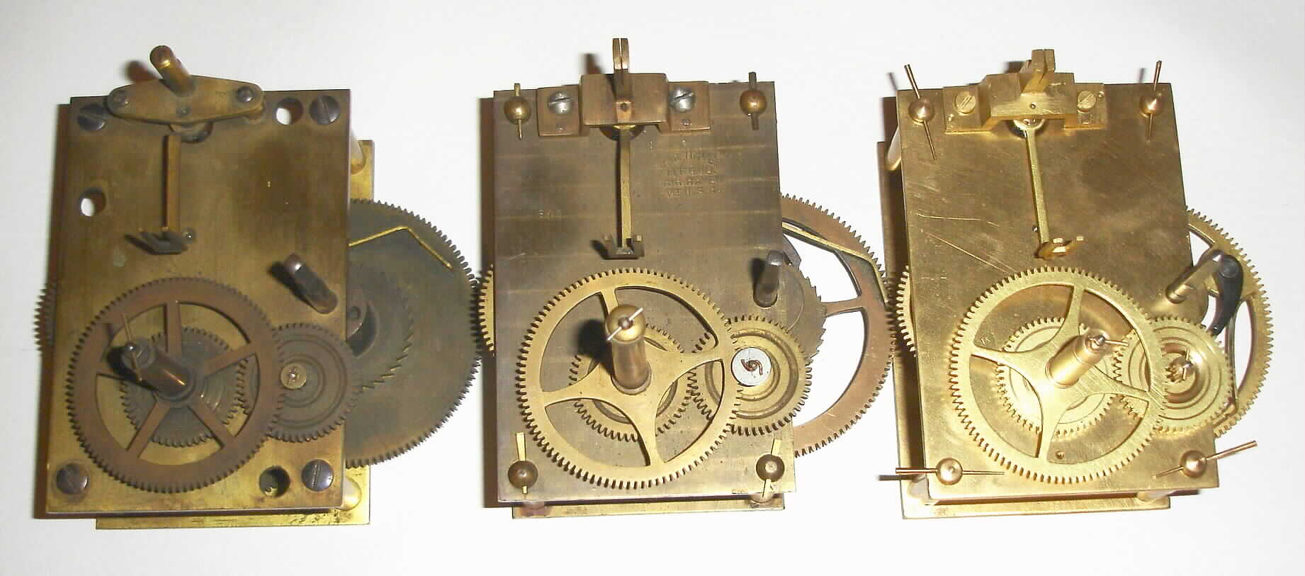 Clock Movements- 3 (Three) weight driven banjo style movements, all with recoil escapements, one signed Fair Haven MFG. Co. Fair Haven Vt. USA, one numbered 3206 on front plate, and one unmarked. — Antique Clocks Price Guide
