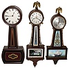 Clocks- 3 (Three) banjo wood cases and reverse paint glasses: Seth Thomas and Telechron, 20th century