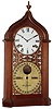 Ithaca Calendar Clock Co., Ithaca, NY, "Shelf Steeple" 8 day walnut time and strike double dial calendar clock, c1875