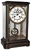 French for Tiffany and Comp, New York "Crystal Regulator", 8 day, time and bell strike, spring driven movement with center sweep seconds, compensated pendulum and white enamel dial in brass case with beveled glasses, c1900