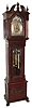 Herschede Clock Co., Cincinnati, Ohio, "Tubular Chime Tall Clock Pattern No. 5", 8 day, moon phase, time, strike and chime, weight driven J.J. Elliot Ltd., London movement Westminster chiming on five signed Walter Durfee patented tubes in a mahogany case with applied carvings to base, paw feet, beveled glass trunk door, reeded and smooth quarter columns on trunk conforming with reeded and smooth full columns flanking hood door and broken arch pediment top. The brass dial has an applied silvered chapter ring with raised brass Arabic numerals, intricately cut and engraved corner spandrels and dial center and painted moon phase disc, c1900