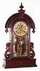 Waterbury Clock Co., Waterbury, Conn., "Paris" walnut 8 day, time, strike and alarm mantel clock, c1891