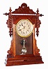 Waterbury Clock Co., Waterbury, Conn., "Buffalo" walnut 8 day, time, strike and calendar shelf clock, c1891