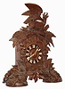 German, Black Forest shelf cuckoo, with wooden plated , 8 day, movement, double fusee, the case profusely decorated with ferns and surmounted by a large eagle bravely attacking a mountain goat, c1880