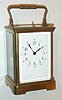 French, 8 day, time, strike and repeat brass cased carriage clock in a corniche case, c1900.