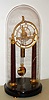 Austrian, Mathias Wibral [in Wien], a weight driven, pull wind, 2-wheel Empire era skeleton clock, with mercurial compensating pendulum, first qtr of 19th Century, with glass dome, one day duration.