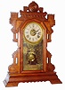 Terry Clock Co., Pittsfield, Mass. "Highland" walnut 8 day, time, strike and alarm parlor clock, c1885
