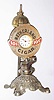 Waterbury Clock Co., Waterbury, Conn., advertising 30 hour cast iron time piece with "Netherland Cigar" cutter and lamp, c1910