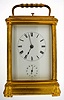 Patay, Paris, French grand sonnerie repeating carriage clock in gilt Gorge case, spring powered eight day movement with time, strike and alarm, sounding the hours and ting tang quarters on two bells, silvered lever platform escapement, strike select lever on back plate, signed Patay Paris, gilt Gorge case with beveled glass front sides and top, the back with a solid door and shutter to allow access for winding and setting without opening, vented base for greater strike volume, white enamel dial with Roman numeral dial, and Arabic alarm, blued steel hands, c1870