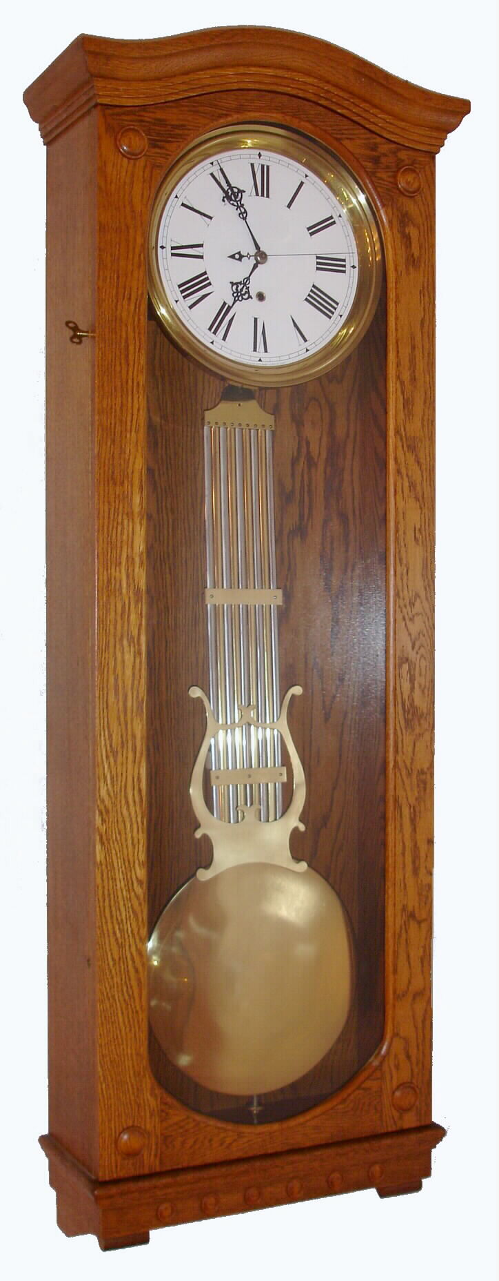 Waterbury Clock Co., Waterbury, Conn., regulator wall clock, 8 day, time only movement with grid iron pendulum now in Standard Electric oak wall case with sweep second's hand movement, c1890 — Antique Clocks Price Guide