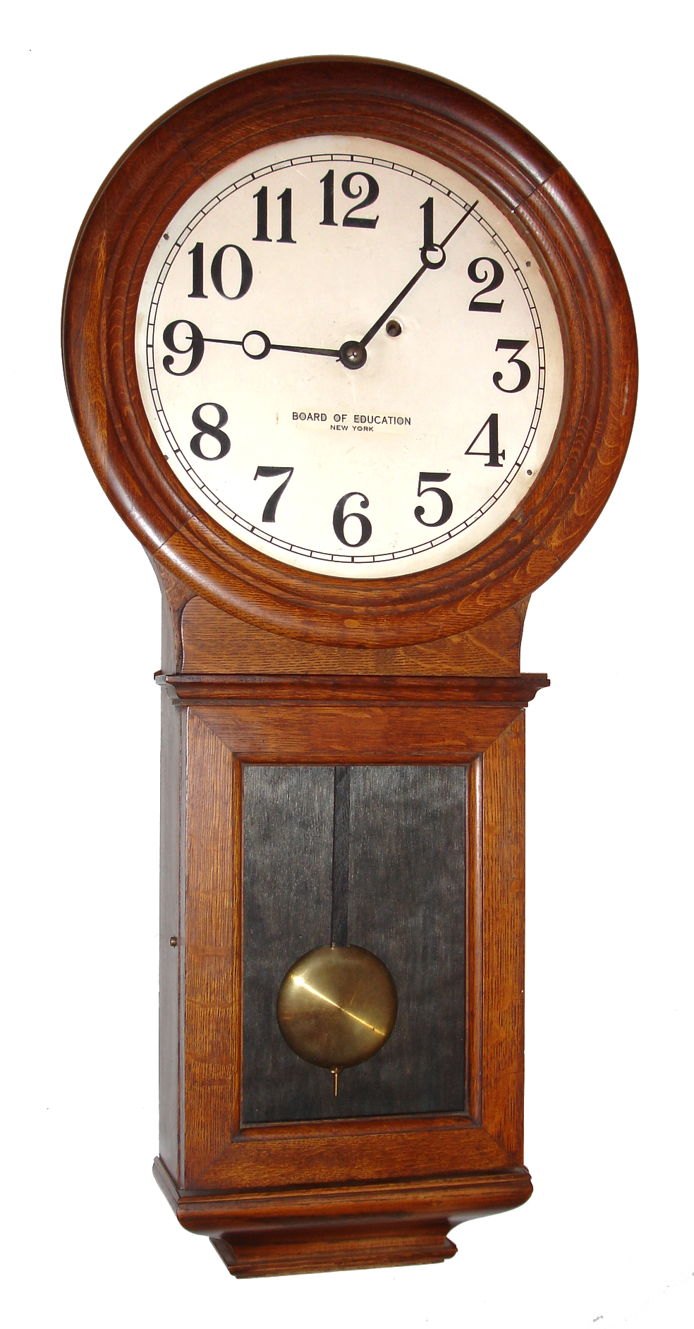 Chelsea Clock Co., Boston, Mass., "No. 1 Pendulum" wall clock, 8 day, time only, weight driven movement in an oak case with painted aluminum dial signed "BOARD OF EDUCATION NEW YORK", c1900 — Antique Clocks Price Guide
