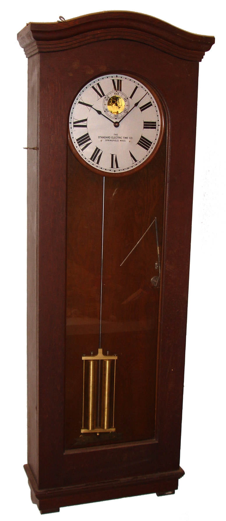 Standard Electric Time Co., Springfield, Mass., "Master Clock", time only, electrically wound spring driven movement with contacts to run slave clocks and unusual pendulum beat sensor / transmitter apparatus in an dark oak case with metal dial, c1930 — Antique Clocks Price Guide