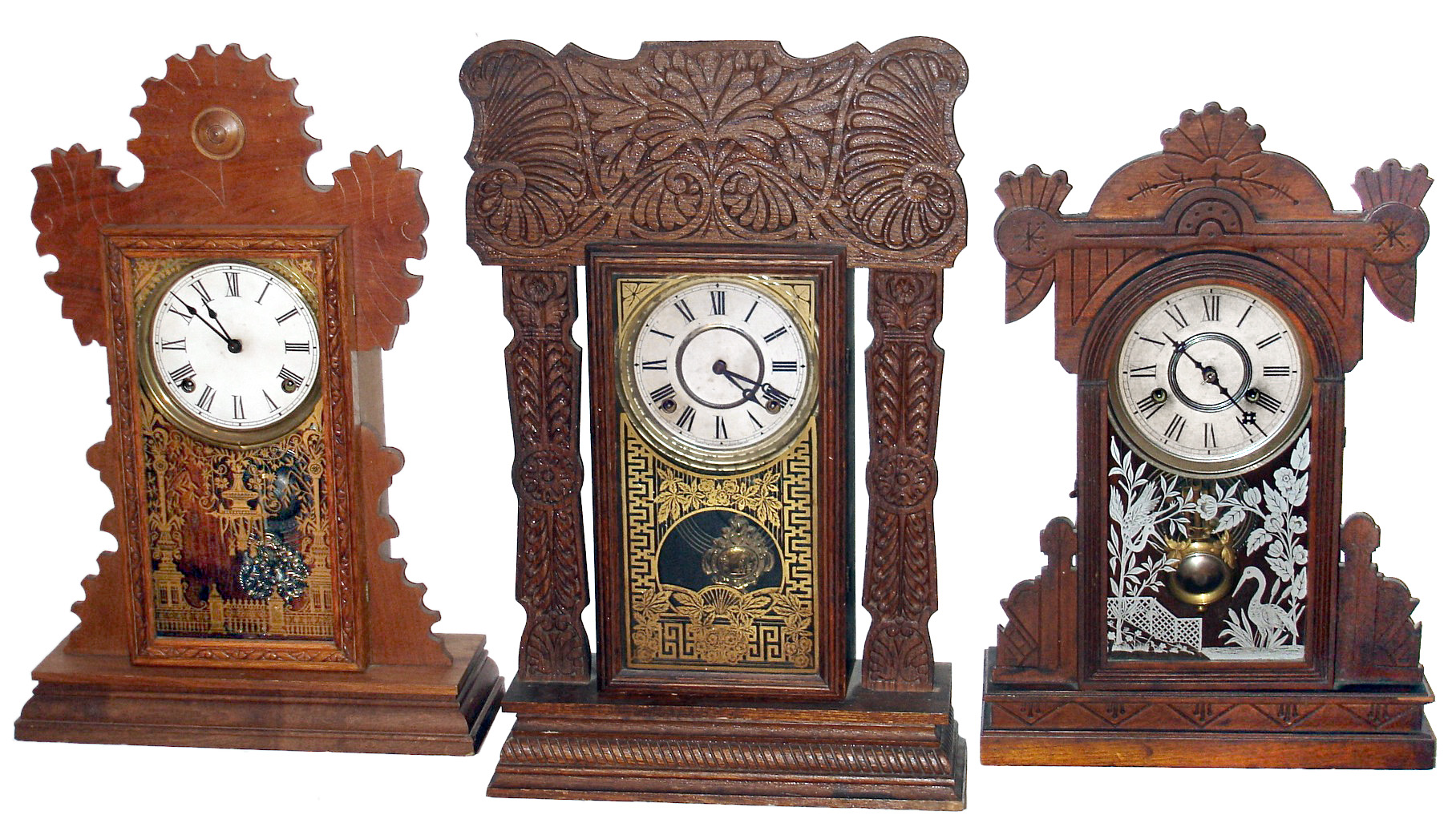 Clocks- 3 (Three) Connecticut, 8 day, time and strike, wood kitchen clocks: two Ingraham; one Gilbert; late 19th century — Antique Clocks Price Guide