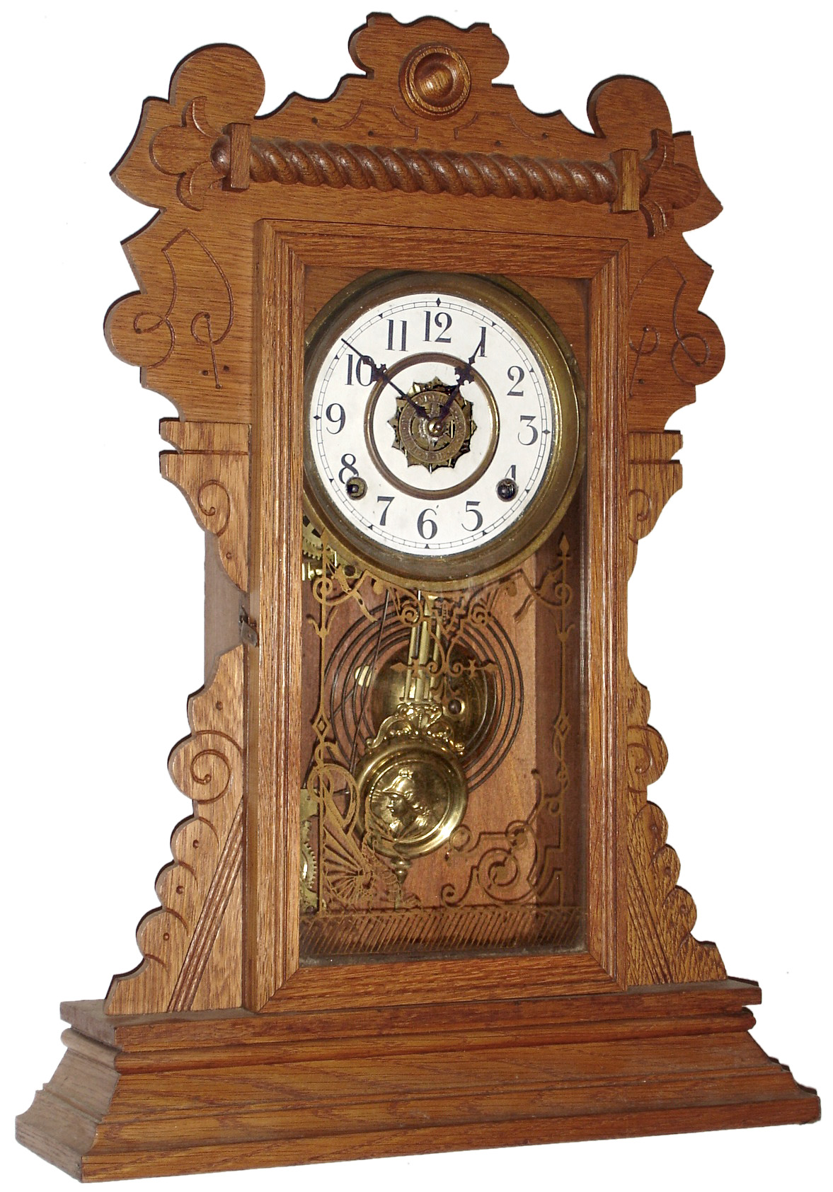 Waterbury Clock Co., Waterbury, Conn., "Mansfield", 8 day, time and strike, oak kitchen clock, c1891. — Antique Clocks Price Guide
