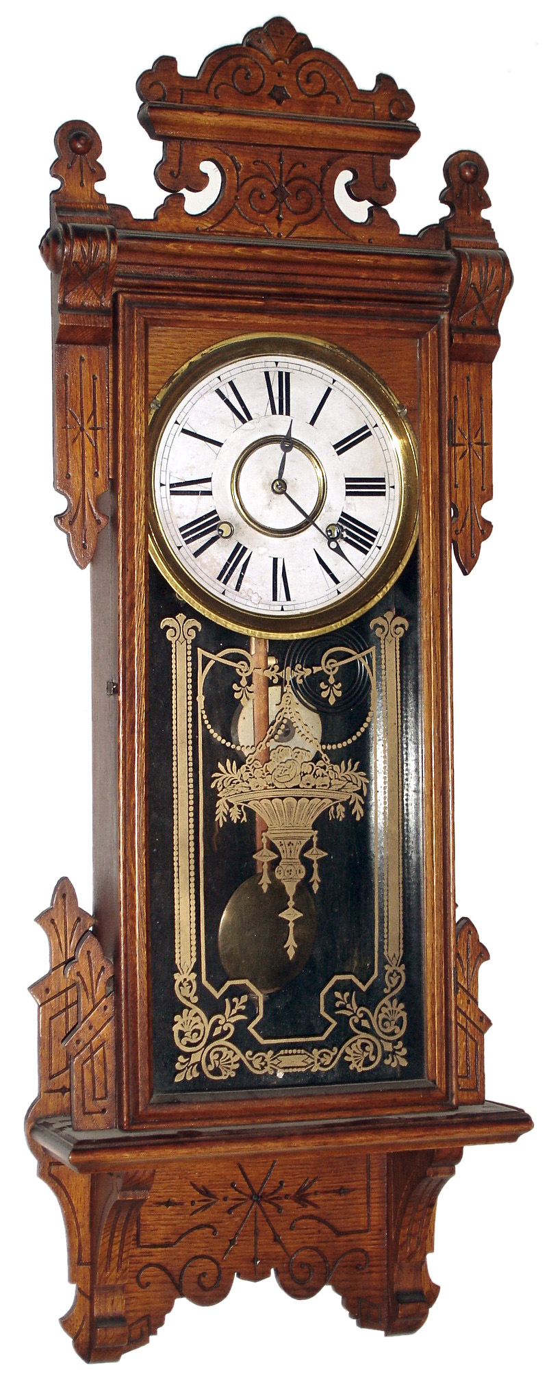 Wm. L. Gilbert Clock Co., Winsted, Conn., "Thespian", 8 day, time and strike, walnut wall clock, c1910 — Antique Clocks Price Guide