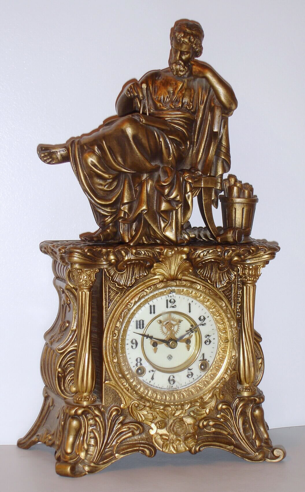 Ansonia Clock Co., New York, NY cast metal figural clock, "MINERVA" with Philosopher statue, c1890 — Antique Clocks Price Guide