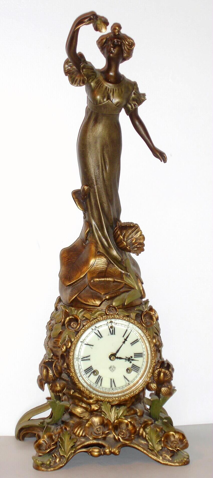 Ansonia Clock Co., New York, NY, "FLEUR-DE-LIS" and figure 1178.  This is one of the most beautiful combinations offered by Ansonia, and reflects the height of Art Nouveau style, c1904 — Antique Clocks Price Guide